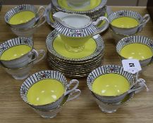 A Shelley China yellow ground tea set for twelve