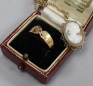 A 9ct gold mounted cameo on 9ct chain, a yellow metal ring and a Cartier box.