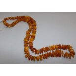 A single strand jagged amber bead necklace, gross weight 60 grams, 76cm.