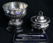 A late Victorian demi fluted silver rose bowl, a cased shoe horn and plated tureen.