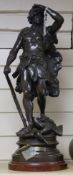 After L. Moreau. A bronzed spelter figure of a hunter 'En Vedette'