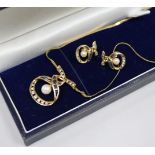 A modern Italian Uno a Erre 18ct gold sapphire, diamond and cultured pearl necklace and pair of