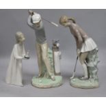 A Lladro golfers group and girl with candle
