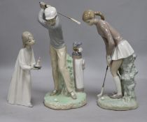 A Lladro golfers group and girl with candle