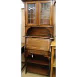 An Edwardian satinwood banded mahogany student's desk with bookcase top, W.74cm H.186cm