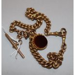 A late Victorian 9ct gold albert chain with carnelian set spinning fob, gross 63 grams