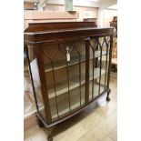 A bow-front china display cabinet, W.122cm