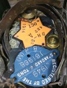 A small collection of horse brasses and martingale straps