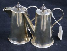A silver cafe au lait set, of plain tapered cylindrical form with turned wood finials, Sheffield