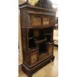 A Japanese carved and stained pine side cabinet with open shelving and lacquered Shibayama doors (