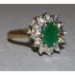 A 9ct gold, emerald and diamond cluster ring