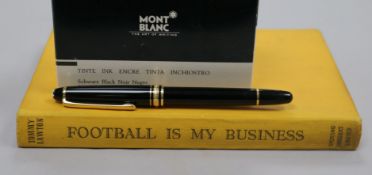 A Mont Blanc pen and football book