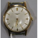 A gentleman's 1960's 9ct gold Longines manual wind wrist watch, (no strap).