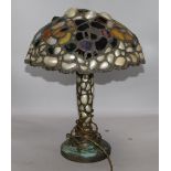An Arts & Crafts shell and stained glass lamp, ( a.f.)