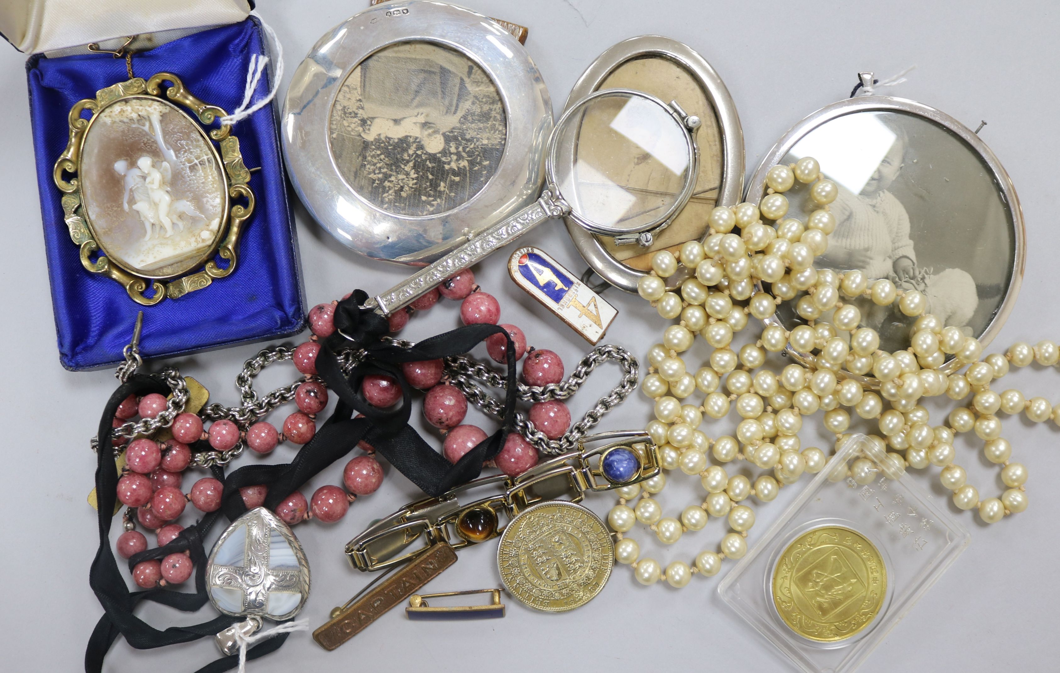 A 19th century Italian cameo brooch in scrolled gilt metal mount and sundries, including a white