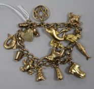 A 9ct gold charm bracelet with padlock clasp, hung with 14 charms, one 18K gold, set with a small