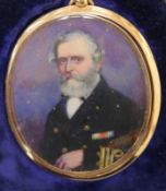 A gold framed miniature of a naval officer
