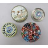 Four Murano glass millefiori paperweights, one with picture of a dog by Ferro & Lazzarini