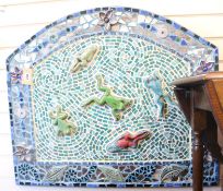 A mosaic frog panel
