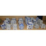 Twenty one Chinese blue and white pierced pot pourri vases and candle holders (various shapes and