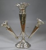 A George V silver epergne having three tapered vases with shaped everted rims (weighted),