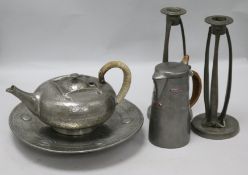 A Liberty & Co English pewter enamelled jug, a pair of similar candlesticks, teapot and tazza