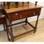 A 17th century style oak side table, W.83cm