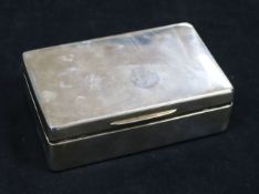 A solid silver twin compartment cigarette box, with additional hinged vesta compartment, London