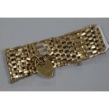 A 9ct gold gate-link bracelet with padlock clasp, 18.3gr