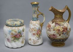 A Doulton Burslem 'roses' ewer and a similar floral jug and biscuit barrel