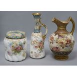 A Doulton Burslem 'roses' ewer and a similar floral jug and biscuit barrel