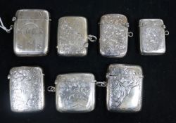 Seven engraved silver vesta cases, various, total 4.8oz