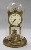 A gilt-brass torsion clock under glass dome