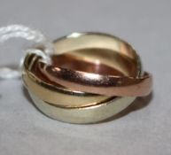 A 9ct three colour gold triple "Russian" wedding ring, size E.