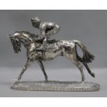 A silver dipped horse and jockey