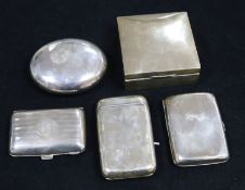 A square silver cigarette box, two silver cigarette cases, a silver cheroot case and an oval