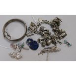 Silver and enamel jewellery, etc, including a charm bracelet with 20 silver and metal charms, an