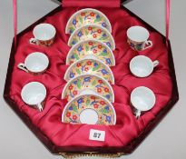 Two sets of ambers beads and a cased coffee set