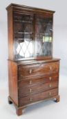 A George III mahogany secretaire bookcase, with Greek key cornice, two astragal glazed doors and