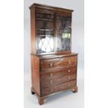 A George III mahogany secretaire bookcase, with Greek key cornice, two astragal glazed doors and