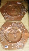 A pair of copper Art Nouveau wall plaques