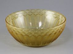 Rene Lalique - a Jaffa amber glass bowl, etched mark R.Lalique, France, 19cm diameter