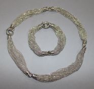 An Italian silver multi fine strand necklace and matching bracelet, with English import marks,