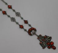 An early 20th century continental silver, enamel and cabochon set drop pendant necklace with