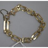 A 9ct gold bracelet with flattened rectangular and double links