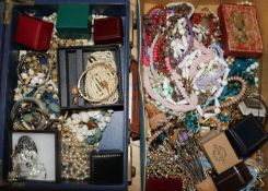 Two boxes of mixed costume jewellery.