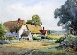 Henry Sylvester Stannard (1870-1951)watercolour,Thatched cottages in a landscape,signed,10 x 14.