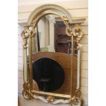 A gilt / eau de nil arched mirror, H.125cm