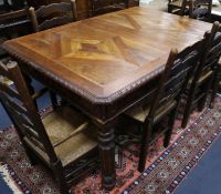 A late 19th century Flemish oak dining table