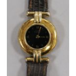 A lady's Must de Cartier silver gilt quartz wrist watch (lacking winding crown).